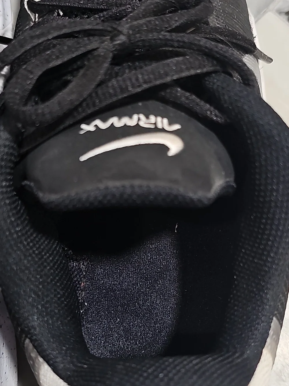 Nike AirMax Impact 4 Men’s Black and White Low-Top Athletic Sneakers